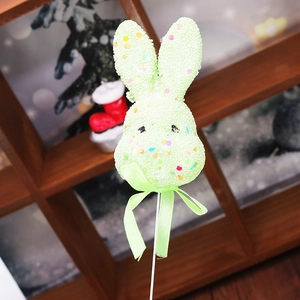 Easter foam bunny picks in vibrant green with colorful sequins and ribbon details