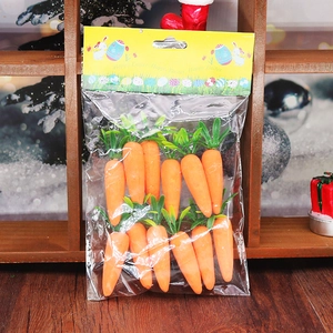 Set of 12 foam decorative Easter carrots with green leaves in a Happy Easter package