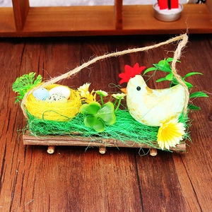 Easter table centerpiece with yellow rooster, foam eggs and wooden base decor