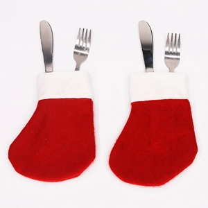 Set of 2 mini red and white Christmas stocking cutlery holders for holiday table decor
