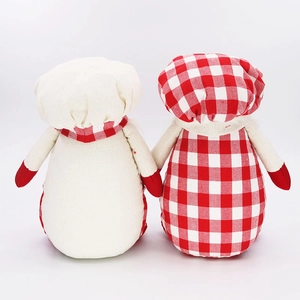 Back view of red and white checkered chef gnome dolls made of canvas fabric
