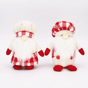 Detail of Swedish Christmas gnomes in red white plaid with soft white faux fur beards