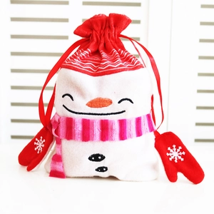 Plush snowman Christmas drawstring gift bag with embroidered details and red gloves