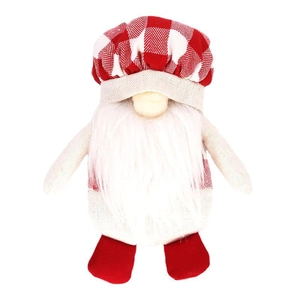 Christmas gnome plush doll with red plaid hat and white beard on white background