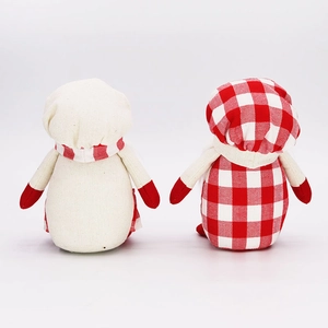 Rear view of red and white checkered plush chef gnomes for Christmas home decoration