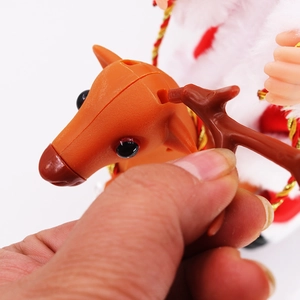 Detail showing the assembly of plastic reindeer head and detachable antlers for Christmas toy