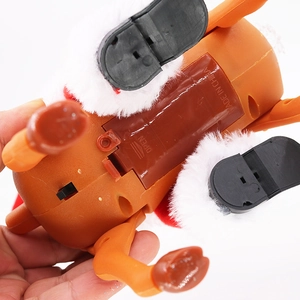 Macro detail of the battery compartment and power switch on the reindeer musical toy