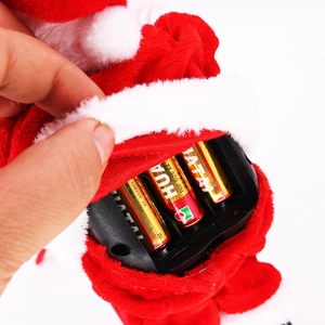 Detail view of the internal battery compartment for the musical Santa Claus toy