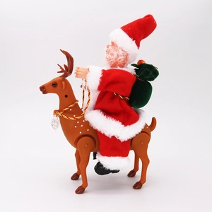 Electric musical Santa Claus riding a reindeer toy with a green gift bag on a white background