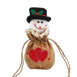 Christmas burlap gift bag featuring a 3D cartoon snowman head and red heart embroidery