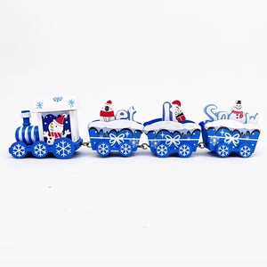 Detail of wooden Christmas train decor with Let It Snow text and polar bear figures
