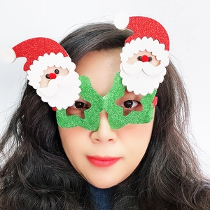 Festliche Weihnachtsbrille mit grünem Glitzerrahmen und Weihnachtsmann für Partys