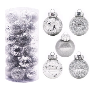 Silver Christmas ball set in transparent barrel with glitter and sequin filling details
