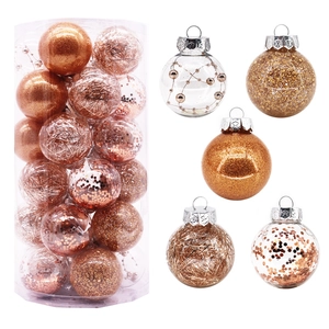Detail of 6cm champagne gold Christmas balls with sequins and glitter in a clear tube