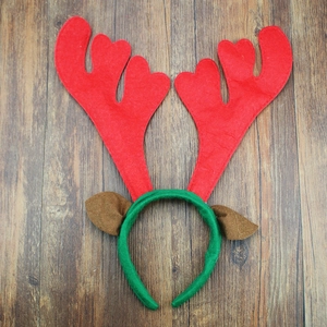 Christmas reindeer antler headband with heart-shaped tips and green plush ear details