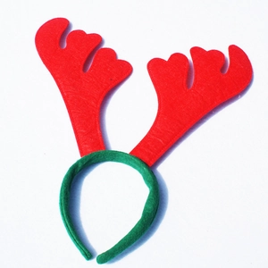 Classic Christmas reindeer antler headband in red and green felt for holiday parties
