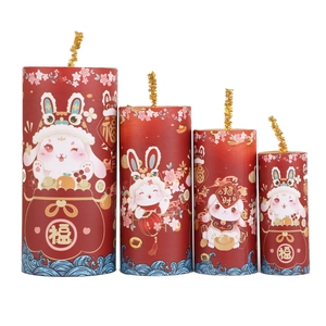 Detail of four cylindrical Chinese New Year firecracker decorations with rabbit illustrations