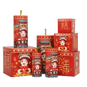 Red Chinese New Year gift boxes and cylinder firecracker containers with lion dance motifs