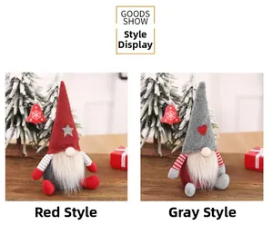 Detail show of two Christmas gnomes with star and heart hats on a wooden holiday tabletop