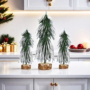 Three-piece set of mini snow-flocked PE Christmas trees with natural wooden bases