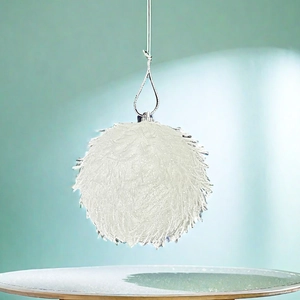 Close-up of white 8cm fuzzy Christmas ball ornament with a silver hanging loop