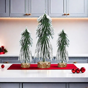 Three-piece mini cedar Christmas tree set with snow flocking and natural wooden bases