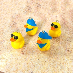 Cute PVC duck charms with sunglasses and blue baseball hats for DIY jewelry and keychains