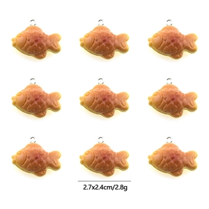 Detailed view of 9 mini resin Taiyaki pendants with precise dimensions and metal rings