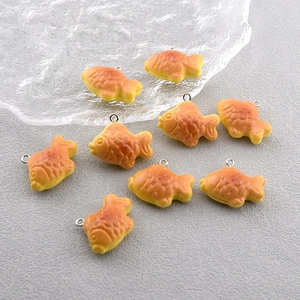 Set of eight realistic resin Taiyaki fish charms for DIY jewelry and keychains