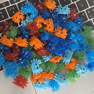 Colorful resin crab charms for DIY jewelry making in various translucent ocean theme colors