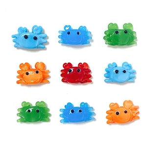 Nine colorful resin crab beads in various vibrant shades for DIY jewelry making