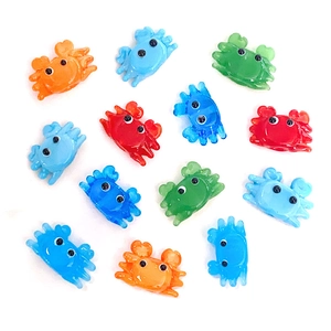 Colorful glass crab charms for DIY jewelry making in vibrant blue red and orange
