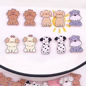 Detailed view of colorful resin cartoon dog charms for DIY jewelry and crafts