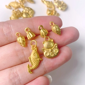 Golden koi fish and fortune cat charms for DIY jewelry with matte frosted finish