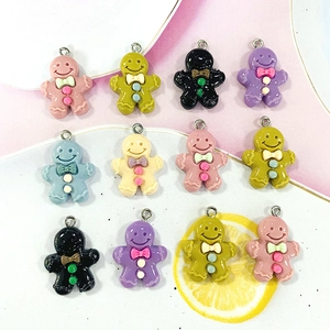 Colorful gingerbread man pendants for DIY jewelry making in multiple vibrant colors