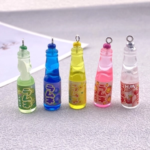 Five colorful resin Ramune soda bottle pendants for DIY jewelry and keychains
