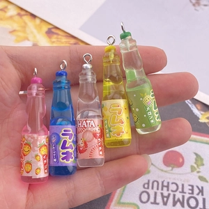 Five colorful resin ramune bottle charms for DIY jewelry and keychains with metal hooks