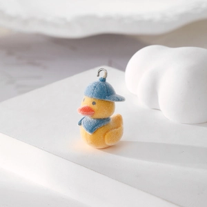 Flocked yellow duck charm with blue hat and scarf for DIY keychains and bag accessories