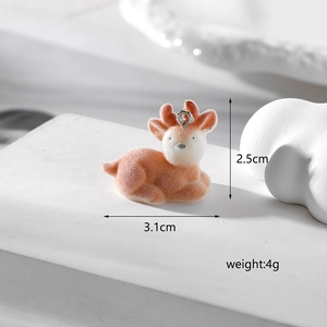 Detail view of a 3.1cm flocked deer pendant with precise dimensions and weight measurements