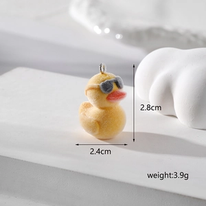 Detail of yellow flocked duck pendant with sunglasses including size and weight specs