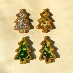 Glittering Christmas tree pendants with star sequins and wooden borders for DIY crafts