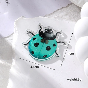 Teal acrylic ladybug charm pendant with glitter, measuring 4.6cm by 4cm for DIY jewelry