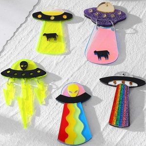 Acrylic UFO and alien pendants in colorful glitter finishes for DIY jewelry making