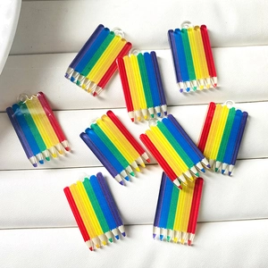 Vibrant acrylic rainbow pencil charms with hooks for creative DIY jewelry making projects
