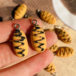 Miniature resin French baguette pendant with chocolate drizzle for DIY jewelry making