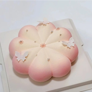 Pink gradient eight-petal flower mousse cake with velvet texture and butterfly decor