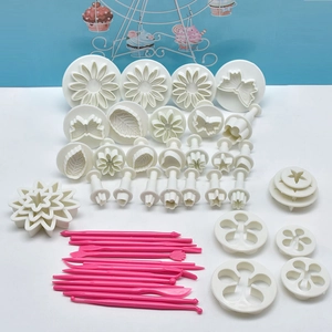 47-piece DIY fondant cake decorating set with white plunger cutters and pink carving tools