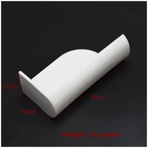 L-shaped white plastic cream scraper tool for cake decorating, 10cm by 4.8cm size