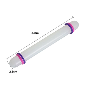23cm non-stick plastic rolling pin with purple and pink thickness rings for baking