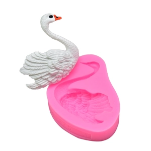 Detailed swan silicone mold for DIY baking with 3D white swan finished sculpture